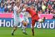 Bayern's Thomas Mueller, right, and Cologne's Frederik Soerensen challenge for the ball during the German Bundesliga soccer match between FC Bayern Munich and FC Cologne in the Allianz Arena in Munich, Germany, on Saturday, Oct. 24, 2015. (AP Photo/Kerstin Joensson)