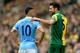 NORWICH, ENGLAND - MARCH 12: Russel Martin of Norwich City and Sergio Aguero of Manchester City talk during the Barclays Premier League match between Norwich City and Manchester City at Carrow Road on March 12, 2016 in Norwich, England. (Photo by Stephen Pond/Getty Images)