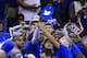 The Kansas Jayhawks pose for a team photo after winning an NCAA college basketball game against West Virginia in the finals of the Big 12 conference tournament in Kansas City, Mo., Saturday, March 12, 2016. (AP Photo/Orlin Wagner)