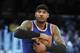New York Knicks forward Carmelo Anthony grabs the basketball prior to an NBA basketball game against the Los Angeles Lakers in Los Angeles, Sunday, March 13, 2016. (AP Photo/Alex Gallardo)