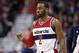 Washington Wizards guard John Wall (2) comes back in the game after a break during the first half of an NBA basketball game against the Detroit Pistons, Monday, March 14, 2016, in Washington. (AP Photo/Alex Brandon)