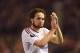 Blind applauds disappointed supporters after United's loss at Anfield.