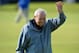 Winner of The Open in 1961 and 1962, US golfer Arnold Palmer waves to fans during the Champion Golfers' Challenge on The Old Course at St Andrews in Scotland, on July 15, 2015, ahead of The 2015 Open Golf Championship which runs July 16-19. 28 Seven groups of four Champion golfers with a combined 46 victories in golfs oldest Championship, compete in a four hole challenge, the winnings going to the charity of the winning team's choice. AFP PHOTO / GLYN KIRK (Photo credit should read GLYN KIRK/AFP/Getty Images)