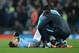Manchester City's Argentinian defender Nicolas Otamendi receives medical treatment following a clash with Dynamo Kiev's Ukrainian midfielder Vitaliy Buyalskiy (not pictured) during a UEFA Champions League last 16, second leg football match between Manchester City and Dynamo Kiev at the Etihad Stadium in Manchester, north west England, on March 15, 2016. / AFP / OLI SCARFF (Photo credit should read OLI SCARFF/AFP/Getty Images)