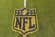 A general view of an NFL logo on the 50-yard line prior to an NFL football game between the Cleveland Browns and the Baltimore Ravens Monday, Nov. 30, 2015, in Cleveland. Baltimore won 33-27. (AP Photo/David Richard)