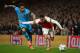 LONDON, ENGLAND - FEBRUARY 23: Alexis Sanchez of Arsenal takes on Dani Alves of Barcelona during the UEFA Champions League round of 16 first leg match between Arsenal and Barcelona on February 23, 2016 in London, United Kingdom. (Photo by Paul Gilham/Getty Images)