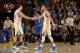 OAKLAND, CA - MARCH 3: Klay Thompson #11 and Stephen Curry #30 of the Golden State Warriors shake hands against the Oklahoma City Thunder on March 3, 2016 at ORACLE Arena in Oakland, California. NOTE TO USER: User expressly acknowledges and agrees that, by downloading and or using this photograph, user is consenting to the terms and conditions of Getty Images License Agreement. Mandatory Copyright Notice: Copyright 2016 NBAE (Photo by Noah Graham/NBAE via Getty Images)