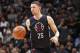 SAN ANTONIO, TX - MARCH 15: Austin Rivers #25 of the Los Angeles Clippers brings the ball up court against the San Antonio Spurs on March 15, 2016 at the AT&T Center in San Antonio, Texas. NOTE TO USER: User expressly acknowledges and agrees that, by downloading and or using this photograph, user is consenting to the terms and conditions of the Getty Images License Agreement. Mandatory Copyright Notice: Copyright 2016 NBAE (Photos by Chris Covatta/NBAE via Getty Images)