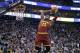 Cleveland Cavaliers forward LeBron James (23) dunks the ball against the Utah Jazz during the first quarter of an NBA basketball game Monday, March 14, 2016, in Salt Lake City. (AP Photo/Rick Bowmer)