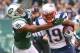Dec 27, 2015; East Rutherford, NJ, USA; New England Patriots wide receiver Brandon LaFell (19) runs with the ball while New York Jets free safety Marcus Gilchrist (21) attempts to tackle him during the first half at MetLife Stadium. Mandatory Credit: Ed Mulholland-USA TODAY Sports