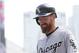 Chicago White Sox’ Adam LaRoche smiles after he scored on a single by Alexei Ramirez off Minnesota Twins pitcher Kyle Gibson in the fourth inning of a baseball game, Thursday, Sept. 3, 2015, in Minneapolis. (AP Photo/Jim Mone)