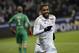 Lyon's Alexandre Lacazette celebrates after scoring a goal during the French League One soccer match between Lyon and Guingamp in Decines, near Lyon, central France, Sunday, March 6, 2016. (AP Photo/Laurent Cipriani)