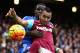 LONDON, ENGLAND - OCTOBER 24: Dimitri Payet of West Ham United and Kurt Zouma of Chelsea compete for the ball during the Barclays Premier League match between West Ham United and Chelsea at Boleyn Ground on October 24, 2015 in London, England. (Photo by Clive Rose/Getty Images)
