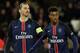 Paris Saint-Germain's Swedish forward Zlatan Ibrahimovic (L) and French defender Presnel Kimpembe are pictured during the French L1 football match between Paris Saint-Germain (PSG) vs Angers on January 23, 2016 at the Parc des Princes stadium in Paris. / AFP / FRANCK FIFE (Photo credit should read FRANCK FIFE/AFP/Getty Images)