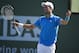Novak Djokovic, of Serbia, reacts while playing Jo-Wilfried Tsonga, of France, during their quarterfinal match at the BNP Paribas Open tennis tournament, Friday, March 18, 2016, in Indian Wells, Calif. (AP Photo/Mark J. Terrill)