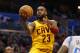 Cleveland Cavaliers forward LeBron James (23) takes a shot against the Orlando Magic during the first half of an NBA basketball game, Friday, March 18, 2016, in Orlando, Fla. (AP Photo/Scott Audette)