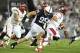 Sep 19, 2015; University Park, PA, USA; Rutgers Scarlet Knights quarterback Chris Laviano (5) is pressured by Penn State Nittany Lions defensive end Carl Nassib (95) in the second quarter at Beaver Stadium. Mandatory Credit: Evan Habeeb-USA TODAY Sports
