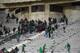 Rival fans of Raja de Casablanca football club clash at the end of a football match between their team and Chabab Rif Al Hoceima on March 19, 2016, at the Mohammed V stadium in Moroccan city of Casablanca. / AFP / STR (Photo credit should read STR/AFP/Getty Images)