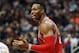 Houston Rockets center Dwight Howard (12) reacts after being called for a foul in the first half of an NBA basketball game against the Atlanta Hawks Saturday, March 19, 2016, in Atlanta. (AP Photo/John Bazemore)