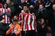 Southampton's Italian striker Graziano Pelle (L) celebrates scoring his team's second goal with Southampton's Irish striker Shane Long during the English Premier League football match between Southampton and Liverpool at St Mary's Stadium in Southampton, southern England on March 20, 2016. / AFP / ADRIAN DENNIS / RESTRICTED TO EDITORIAL USE. No use with unauthorized audio, video, data, fixture lists, club/league logos or 'live' services. Online in-match use limited to 75 images, no video emulation. No use in betting, games or single club/league/player publications. / (Photo credit should read ADRIAN DENNIS/AFP/Getty Images)