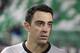 Qatari Al-Sadd club's Xavi Hernandez (L) of Spain looks on during the Sheikh Jassim Cup final football match against Lekhwiya on January 21, 2016 in Doha.
Lekhwiya won the match 4-1. / AFP / Karim JAAFAR (Photo credit should read KARIM JAAFAR/AFP/Getty Images)