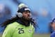 Seattle Seahawks cornerback Richard Sherman warms up before the first half of an NFL divisional playoff football game between the Carolina Panthers and the Seattle Seahawks, Sunday, Jan. 17, 2016, in Charlotte, N.C. (AP Photo/Bob Leverone)