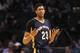 Mar 9, 2016; Charlotte, NC, USA; New Orleans Pelicans forward center Anthony Davis (23) signals over to his bench during the second half of the game against the Charlotte Hornets at Time Warner Cable Arena. The Hornets won 122-113. Mandatory Credit: Sam Sharpe-USA TODAY Sports