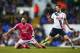 LONDON, ENGLAND - MARCH 20: Marc Pugh of Bournemouth is challenged by Ryan Mason of Tottenham Hotspur during the Barclays Premier League match between Tottenham Hotspur and A.F.C. Bournemouth at White Hart Lane on March 20, 2016 in London, United Kingdom. (Photo by Paul Gilham/Getty Images)