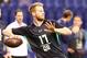 North Dakota State quarterback Carson Wentz performs a drill at the NFL football scouting combine Saturday, Feb. 27, 2016, in Indianapolis. (AP Photo/Gregory Payan)
