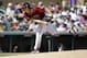 Arizona Diamondbacks' Zack Greinke throws during a spring training baseball game against the Seattle Mariners in Scottsdale, Ariz., Monday, March 14, 2016. (AP Photo/Jeff Chiu)