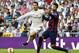 Real Madrid's Portuguese forward Cristiano Ronaldo (L) vies with Barcelona's defender Gerard Pique during the Spanish league 'Clasico' football match Real Madrid CF vs FC Barcelona at the Santiago Bernabeu stadium in Madrid on October 25, 2014. AFP PHOTO / GERARD JULIEN (Photo credit should read GERARD JULIEN/AFP/Getty Images)