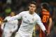 Real Madrid's James Rodriguez celebrates after scoring his team's second goal during the Champions League Round of 16, second leg soccer match between Real Madrid and Roma at the Santiago Bernabeu stadium in Madrid, Tuesday March 8, 2016. (AP Photo/Paul White)