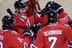 Chicago Blackhawks center Artem Anisimov (15) celebrates with teammates after scoring his goal during the third period of an NHL hockey game against the Detroit Red Wings Sunday, March 6, 2016, in Chicago. The Blackhawks won 4-1. (AP Photo/Nam Y. Huh)