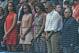 US President Barack Obama (2-R), First Lady Michelle Obama (C), their daughters Sasha and Malia (L) and Cuban President Raul Castro (R) hold a minute of silence for the terrorist attacks which took place in Belgium before a Major League baseball exhibition game at the Latinoamericano stadium in Havana on March 22, 2016. Obama praised the bravery of Cuban dissidents Tuesday in a meeting at the US embassy in Havana, although opponents back home dismissed the event as a 'token' gesture. AFP PHOTO / Rodrigo ARANGUA / AFP / RODRIGO ARANGUA (Photo credit should read RODRIGO ARANGUA/AFP/Getty Images)