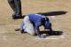 Los Angeles Dodgers' Andre Ethier remains on the ground during the fourth inning of a spring training baseball game against the Arizona Diamondbacks in Scottsdale, Ariz., Friday, March 18, 2016. Ethier left the game after reaching first base on a walk. (AP Photo/Jeff Chiu)