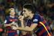 FC Barcelona's Marc Bartra reacts after scoring against Levante during a Spanish La Liga soccer match at the Camp Nou stadium in Barcelona, Spain, Sunday, Sept. 20, 2015. (AP Photo/Manu Fernandez)