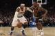 New York Knicks forward Carmelo Anthony (7) drives the ball past Cleveland Cavaliers forward LeBron James (23) during the second half of an NBA basketball game on Friday, Nov. 13, 2015, in New York. The Cavaliers won 90-84. (AP Photo/Kathy Kmonicek)