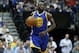 Golden State Warriors’ Draymond Green plays against the Minnesota Timberwolves in the first quarter of an NBA basketball game Monday, March 21, 2016, in Minneapolis. (AP Photo/Jim Mone)