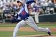 Los Angeles Dodgers starting pitcher Julio Urias throws during a spring training baseball exhibition game against the Chicago Cubs in Mesa, Ariz., on Wednesday, March 11, 2015. (AP Photo/Chris Carlson)