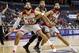 Brothers North Carolina State guard Cody Martin (15) and North Carolina State guard Caleb Martin (14) work to box out Wake Forest guard Rondale Watson (23) during the second half of an NCAA college basketball game in the Atlantic Coast Conference tournament, Tuesday, March 8, 2016, in Washington. NC State won 75-72. (AP Photo/Alex Brandon)
