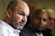 FILE - In this April 9, 2013 file photo, former NFL player Kevin Turner, left, speaks during a news conference in Philadelphia, as former players Dorsey Levens, center, and Bill Bergey listen. The NFL agreed Wednesday, June 25, 2014, to remove a $675 million cap on damages from thousands of concussion-related claims after a federal judge questioned whether there would be enough money to cover as many as 20,000 retired players. The plaintiffs include Kevin Turner, who played for the Philadelphia Eagles and New England Patriots and is now battling ALS. (AP Photo/Matt Rourke, File)