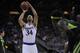 KANSAS CITY, MO - MARCH 11: Perry Ellis #34 of the Kansas Jayhawks shoots a free throw against the Baylor Bears during the semifinals of the Big 12 Basketball Tournament at Sprint Center on March 11, 2016 in Kansas City, Missouri. (Photo by Ed Zurga/Getty Images)