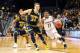 Mar 18, 2016; Brooklyn, NY, USA; Notre Dame Fighting Irish guard Demetrius Jackson (11) drives to the basket against Michigan Wolverines forward Mark Donnal (34) in the second half in the first round of the 2016 NCAA Tournament at Barclays Center. Mandatory Credit: Anthony Gruppuso-USA TODAY Sports