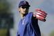 Texas Rangers' pitcher Yu Darvish throws during spring training baseball practice Tuesday, Feb. 23, 2016, in Surprise, Ariz. (AP Photo/Charlie Riedel)