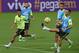 Brazilian national football players Neymar (L) and Lucas take part in a training session at Arena Pernambuco stadium in Recife Brazil on March 24, 2016. Brazil will face Uruguay on March 25 and Paraguay March 29 in FIFA World Cup Russia 2018 South American qualifier matches. AFP PHOTO / VANDERLEI ALMEIDA / AFP / VANDERLEI ALMEIDA (Photo credit should read VANDERLEI ALMEIDA/AFP/Getty Images)