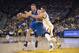 March 25, 2016; Oakland, CA, USA; Dallas Mavericks forward David Lee (42) dribbles the basketball against Golden State Warriors guard Stephen Curry (30) during the second quarter at Oracle Arena. Mandatory Credit: Kyle Terada-USA TODAY Sports