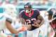 MIAMI GARDENS, FL - OCTOBER 25: Running back Arian Foster #23 of the Houston Texans carries the ball during a NFL game against the Miami Dolphins at Sun Life Stadium on October 25, 2015 in Miami Gardens, Florida. (Photo by Ronald C. Modra/Sports Imagery/Getty Images)