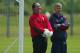 LONDON - MAY 15: Arsenal manager Arsene Wenger (R) and goalkeeper David Seaman share a joke during traing on May 15, 2003 at Arsenals training ground in London. (Photo by Phil Cole/Getty Images)