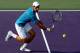 KEY BISCAYNE, FL - MARCH 27: Novak Djokovic of Serbia returns a shot to Joao Sousa of Portugal during the Miami Open presented by Itau at Crandon Park Tennis Center on March 27, 2016 in Key Biscayne, Florida. (Photo by Matthew Stockman/Getty Images)