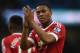 Manchester United's French striker Anthony Martial applauds the crowd following the English Premier League football match between Manchester City and Manchester United at the Etihad Stadium in Manchester, north west England, on March 20, 2016.
Manchester United won the match 1-0. / AFP / PAUL ELLIS / RESTRICTED TO EDITORIAL USE. No use with unauthorized audio, video, data, fixture lists, club/league logos or 'live' services. Online in-match use limited to 75 images, no video emulation. No use in betting, games or single club/league/player publications. / (Photo credit should read PAUL ELLIS/AFP/Getty Images)